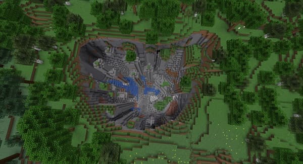 A close-up of a vibrant purple flower with delicate petals and a yellow center, blooming in a garden.