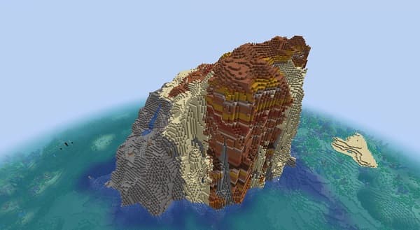 A modern minimalist living room with a white sofa and green plants.