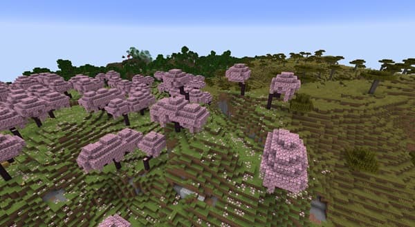 A sleek, modern laptop open on a wooden desk.