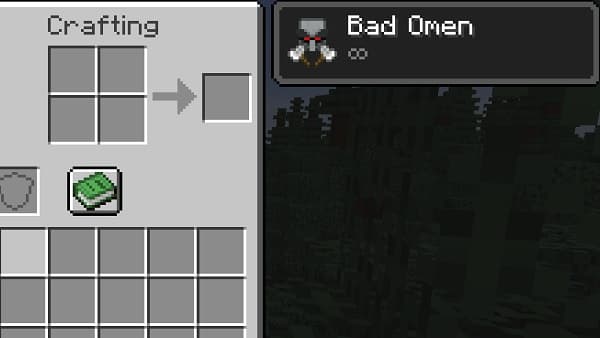 Woman working on laptop at a cafe.