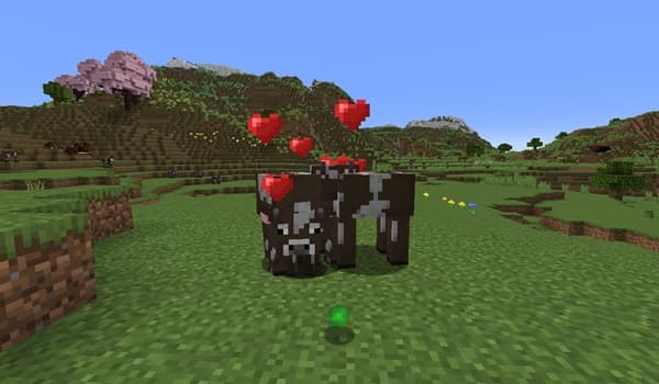 A person's hands holding a smartphone displaying a social media feed.