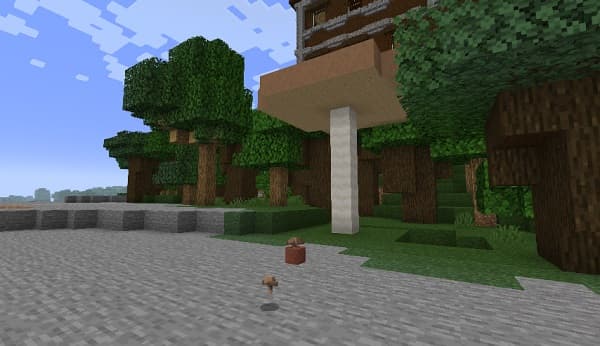 A person's hands holding a smartphone with a blank screen.