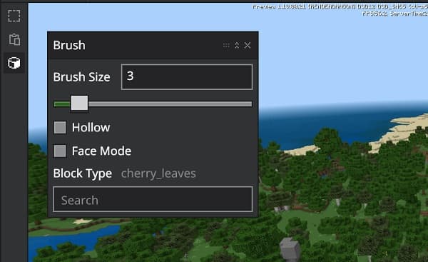 A majestic bald eagle soars through a clear blue sky, its wings spread wide.