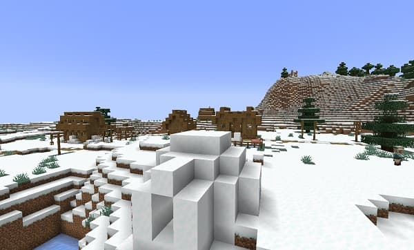 A serene tropical beach with white sand and clear turquoise water.