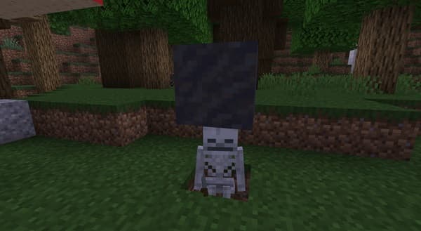 A person's hands holding a smartphone displaying a social media feed.