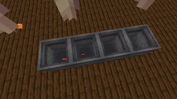 A close-up of a vibrant, healthy green plant with broad leaves.