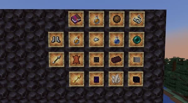 A person in a black shirt and black pants standing with their arms crossed.