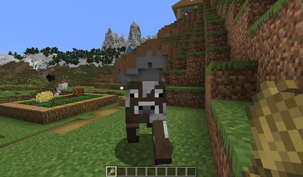 A diverse group of people attending a conference, networking and listening to a speaker.