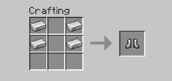 A person working on a laptop at a desk.