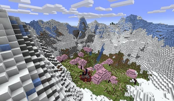 A group of people standing on a beach at sunset, enjoying the view and the peaceful atmosphere.