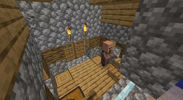 A black and white image of a textured surface, possibly wood grain or fabric.