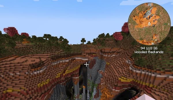 A vibrant abstract painting with flowing purple, blue, and yellow hues.