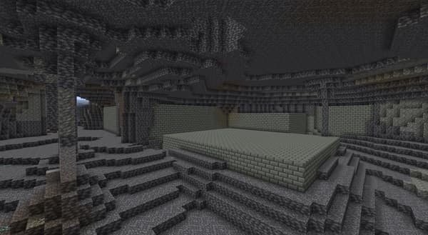 A vibrant field of purple lavender flowers under a clear blue sky.