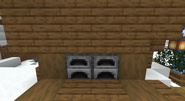 A person's hands holding a smartphone displaying a social media feed.