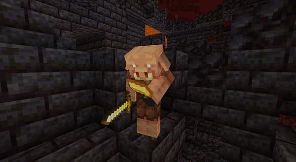 A person's hands holding a smartphone displaying a social media feed.