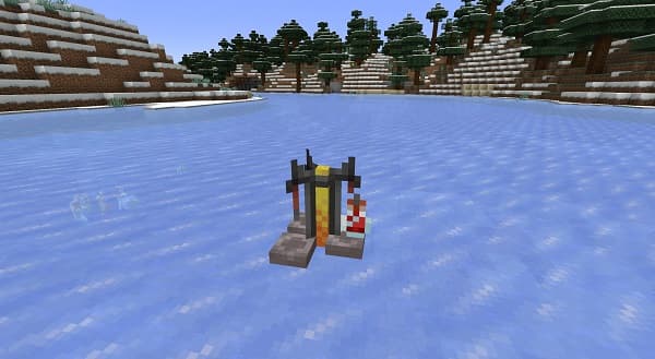 A red pickup truck with a white camper shell parked outdoors.