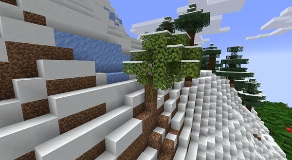 A person holding a smartphone showing a website.