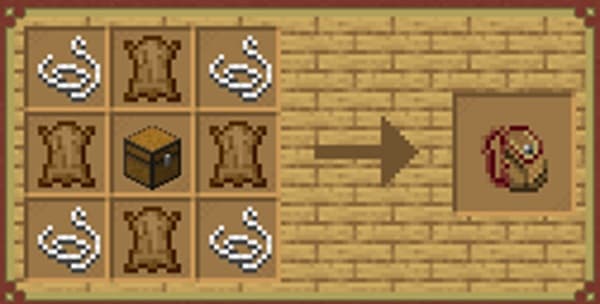 Red apples in a wooden crate.