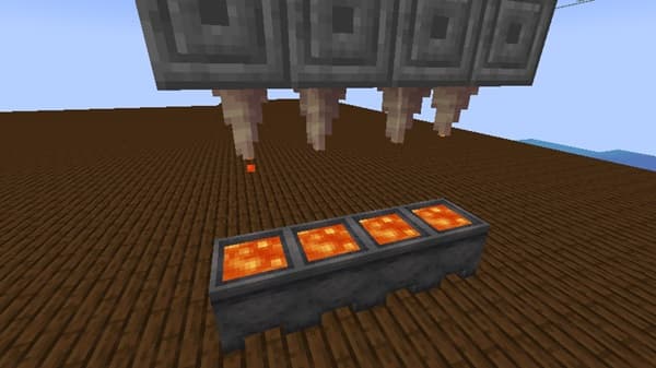 **Image Analysis:** The image shows a close-up of a person's hand typing on a laptop keyboard. The person appears to be wo...