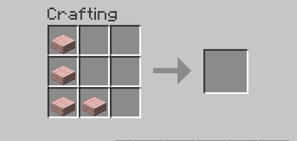 A lone tree with yellow leaves stands on a hill under a clear sky.