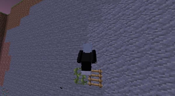 Image of a desk with a laptop, notebooks, and a cup of coffee.