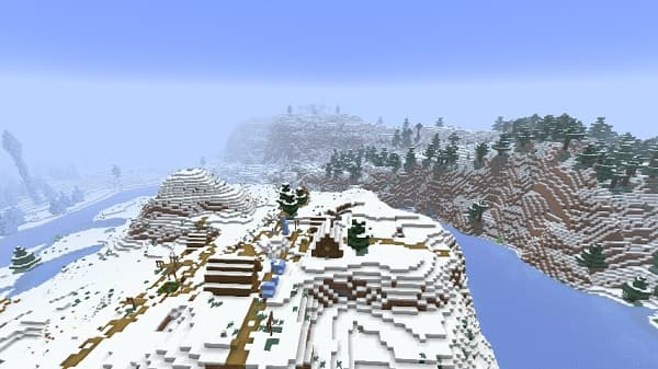 Two young boys playing chess at a wooden table.