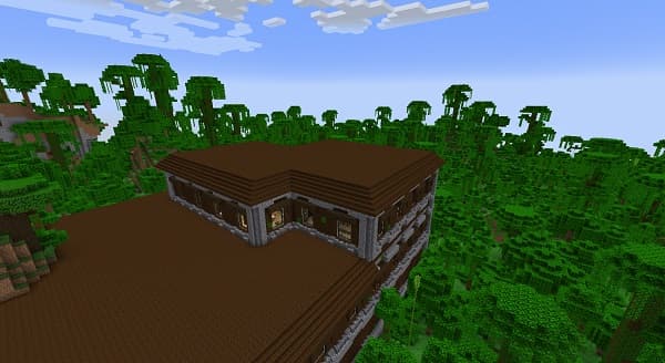 Empty office chairs and desks in a modern, unoccupied workspace.