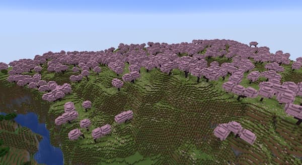 A vibrant, abstract painting with swirling blues, greens, and yellows.