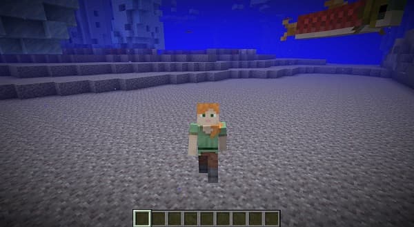 A close-up shot of a white ceramic plate with a gold rim.