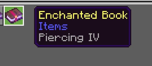 Young boy in a blue shirt and jeans sits on a wooden floor, playing with colorful building blocks.