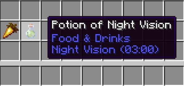 Old-fashioned black rotary phone on a wooden table.