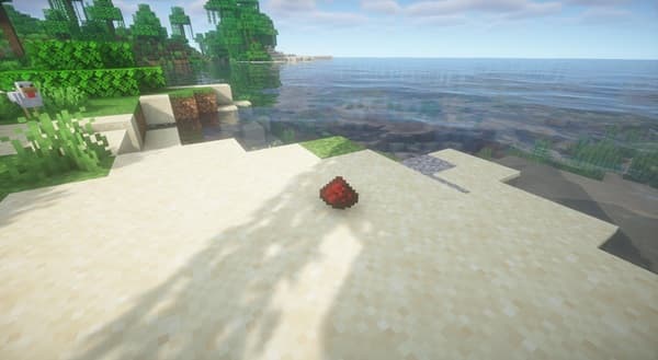 A close-up of a vibrant, intricate mandala drawing with symmetrical patterns.