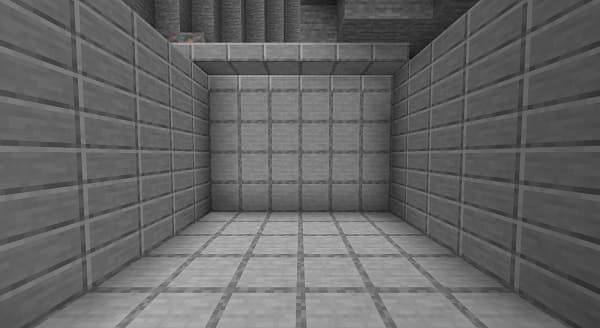 Red velvet cupcake with cream cheese frosting on a white plate.