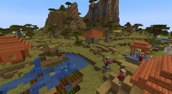 Woman typing on laptop at modern desk.