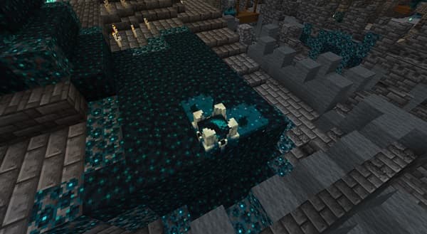 Two hands clasped, showing support and solidarity.