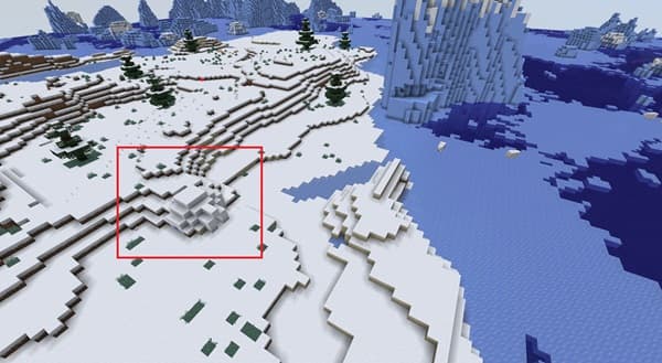 A tranquil beach with clear blue water and white sand.