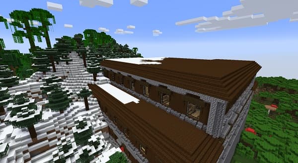 Empty conference room with a large screen and chairs.