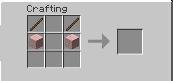 A black and white photo of a man and two women, dressed in historical clothing, posing for a portrait.