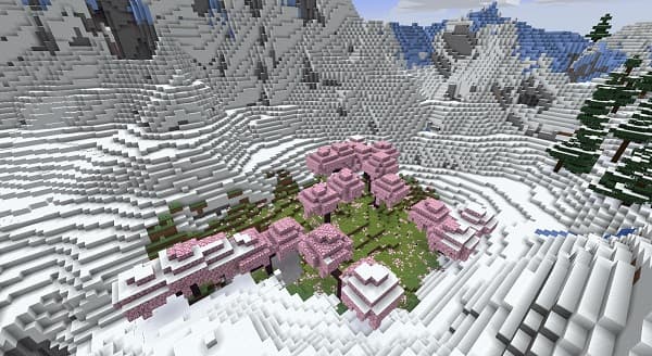 A lone, weathered oak tree stands tall against a vibrant sunset sky in a vast, empty field.