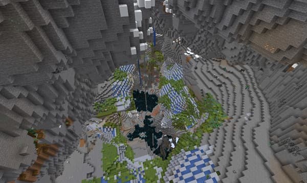 A large black and white bird, possibly a magpie, with a long tail perched on a tree branch.