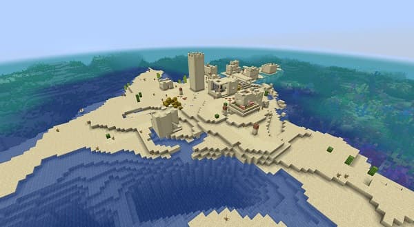 A person sitting at a desk with a laptop and a notebook, working.