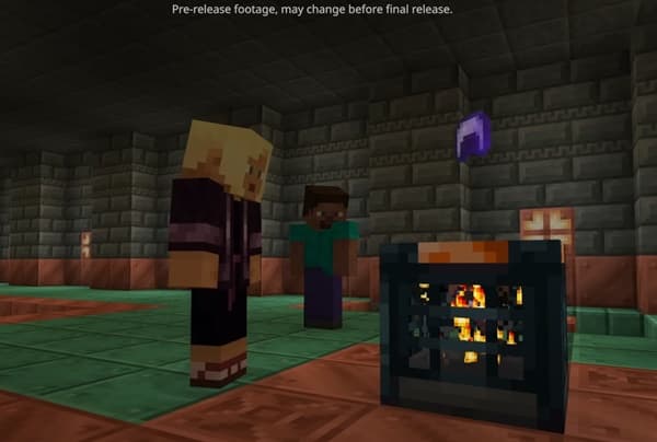 A person uses a digital camera to take a photo.