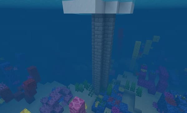 Smiling woman holding a smartphone, showcasing a vibrant display.