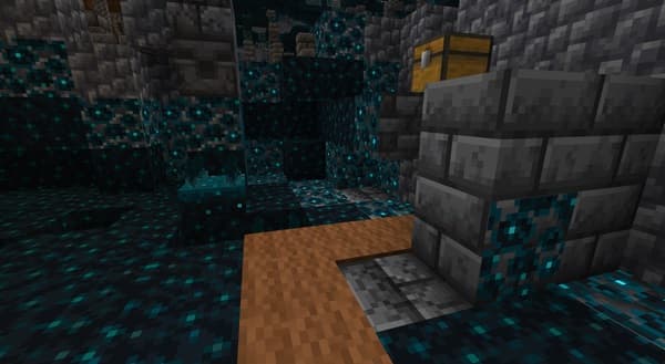 A person working remotely on a laptop in a modern office.