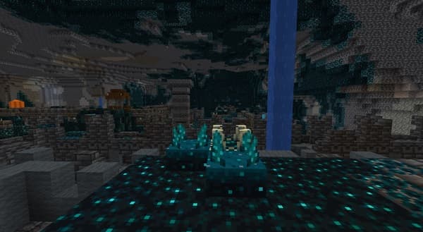 Young woman smiling in a black shirt.