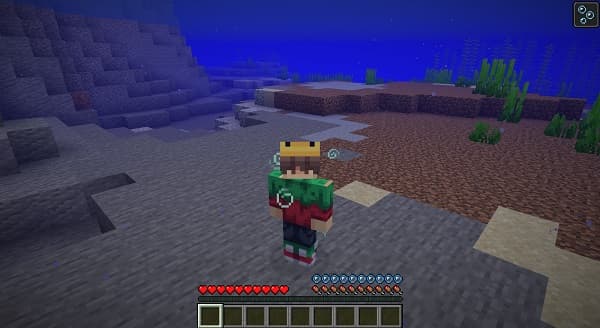 A person's hands holding a smartphone with a blank screen.