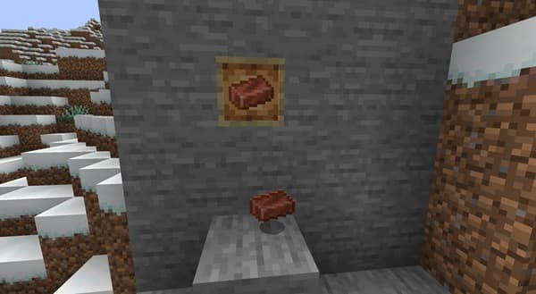 An empty, clean white plate on a dark background.