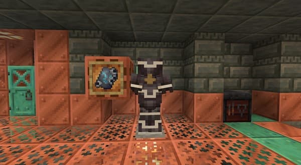 A hand holds a smartphone displaying a social media feed.