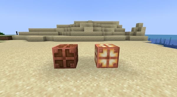 A person's hands holding a smartphone displaying a social media feed.