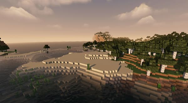 Young woman with long, dark hair enjoying a walk in a lush green park.